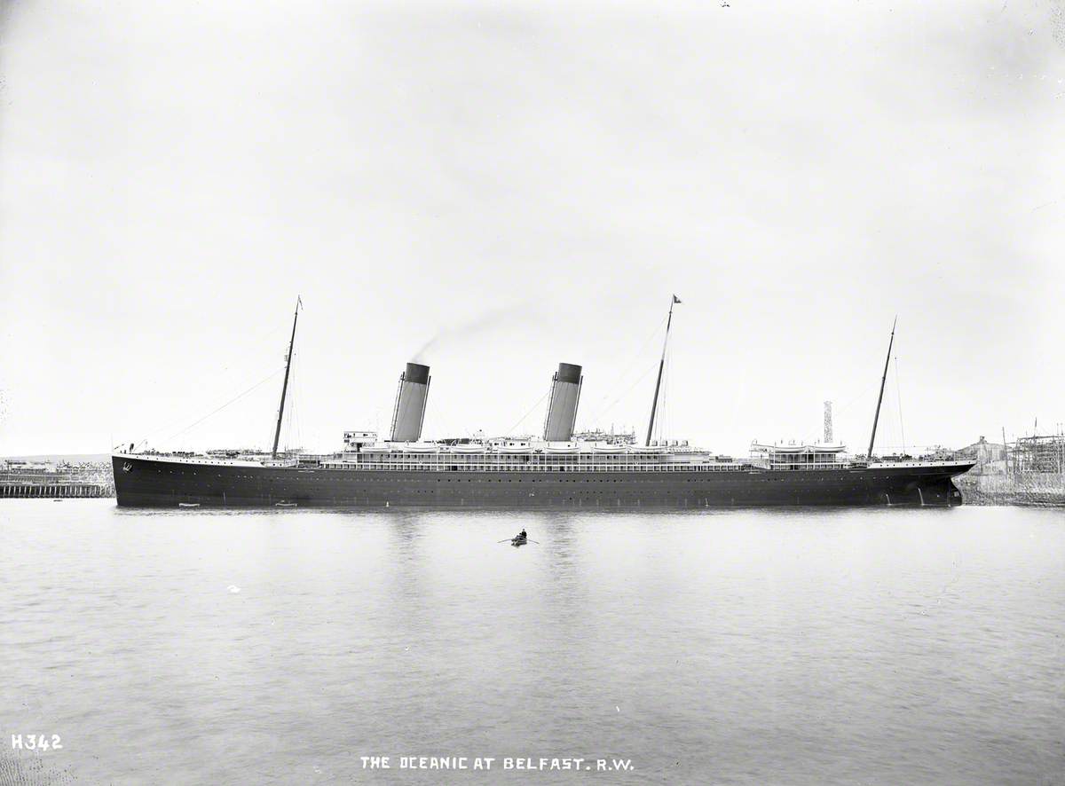 Portside profile of completed ship at outfitting wharf