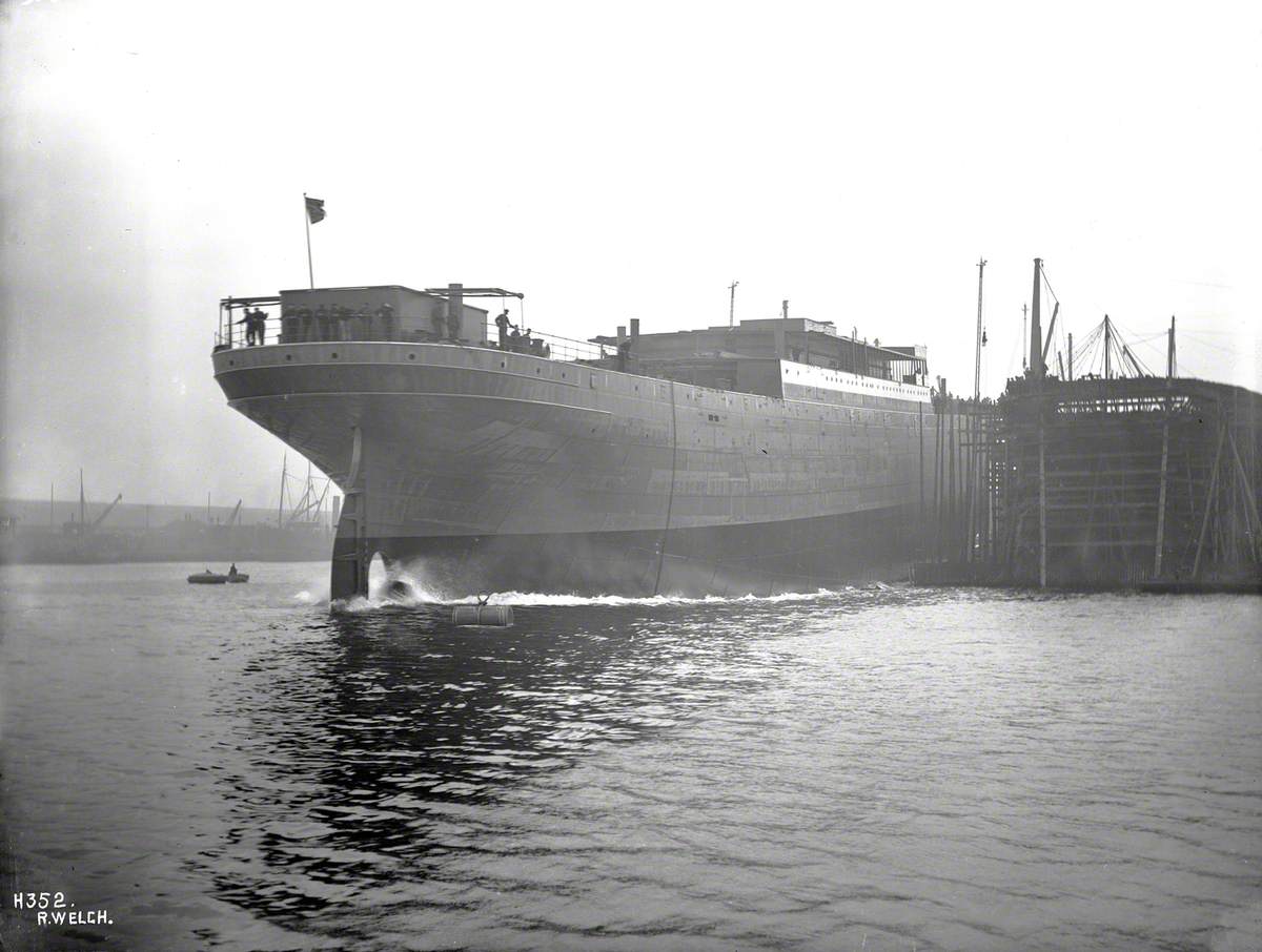 Launch; starboard stern view entering water
