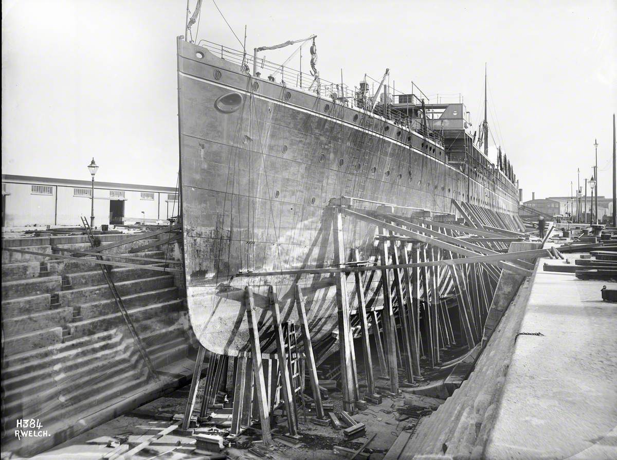 Port bow view in Alexandra graving dock with supporting shores