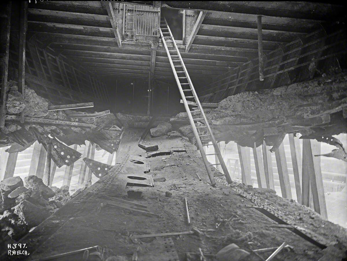 Sequence showing removal of damaged bottom plates