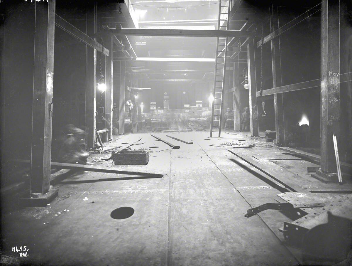 Engine room with floor plates in course of replacement