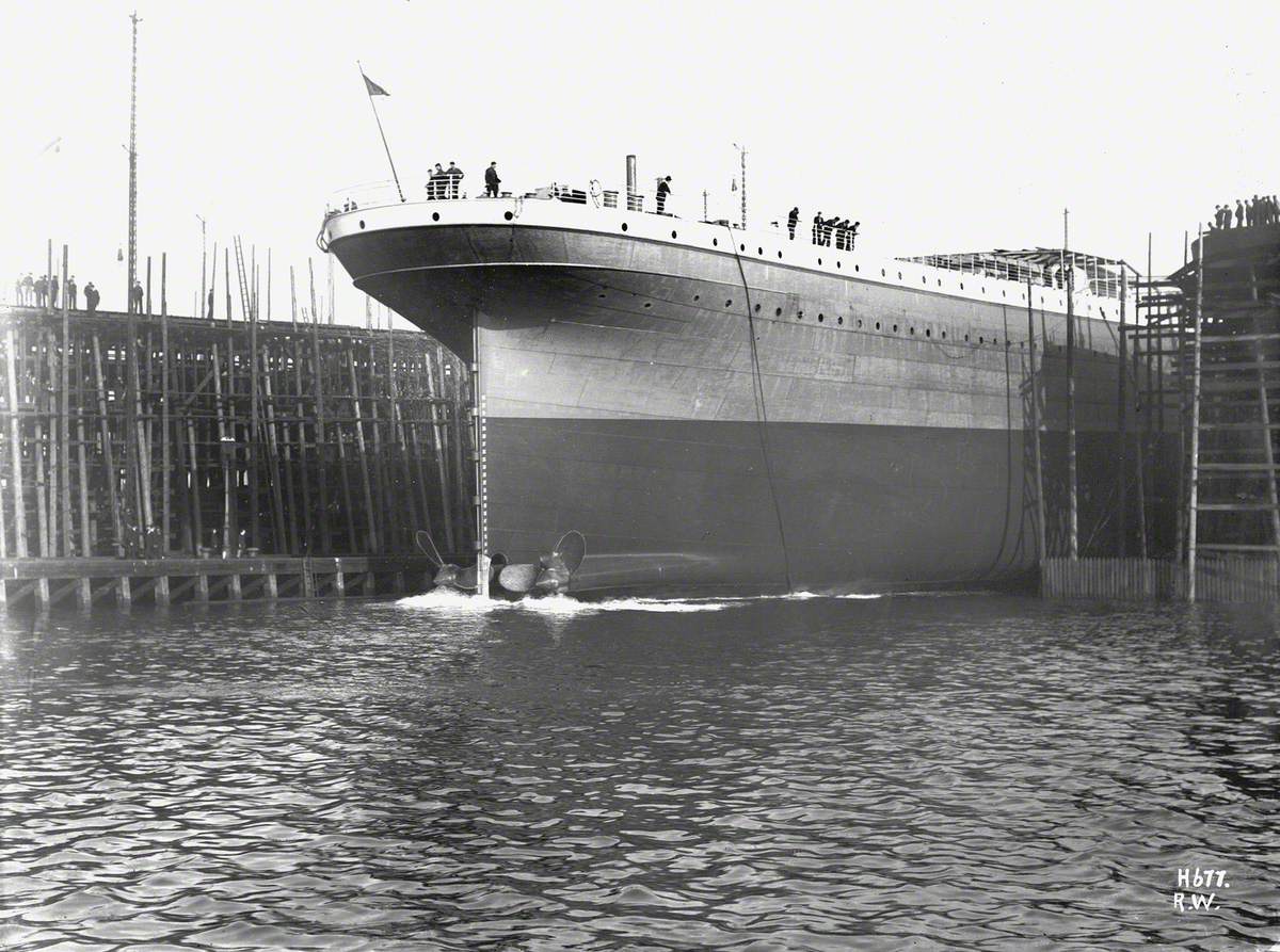 Launch; starboard stern view entering water