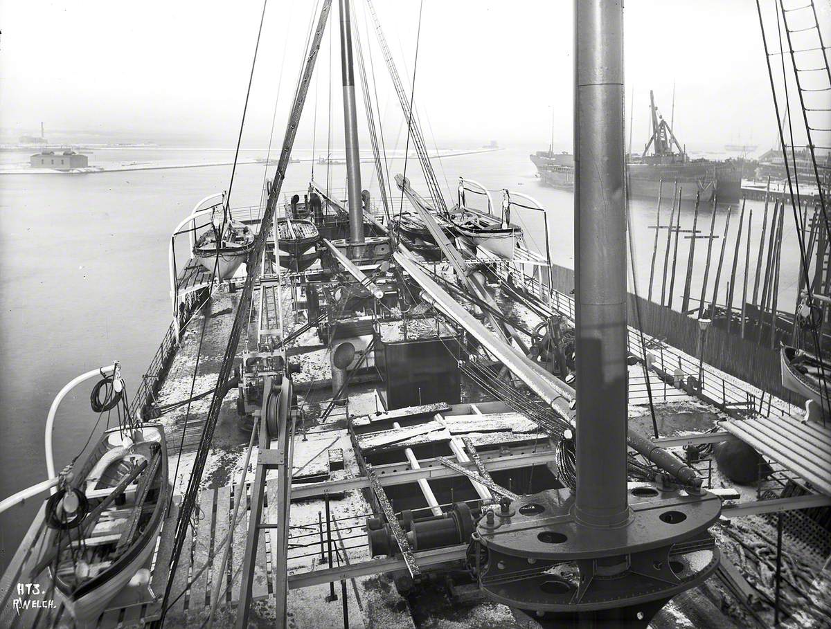 Deck view aft from midships superstructure, nearing completion