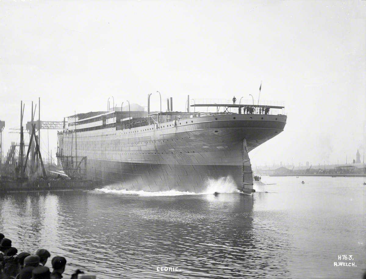 Launch; port stern view entering water