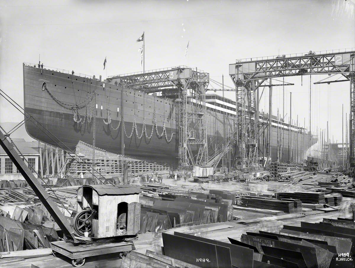 Port bow 3/4 profile on slip prior to launch. Plates and steam crane in foreground