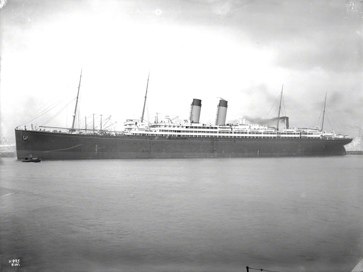 Port profile of completed ship alongside outfitting wharf