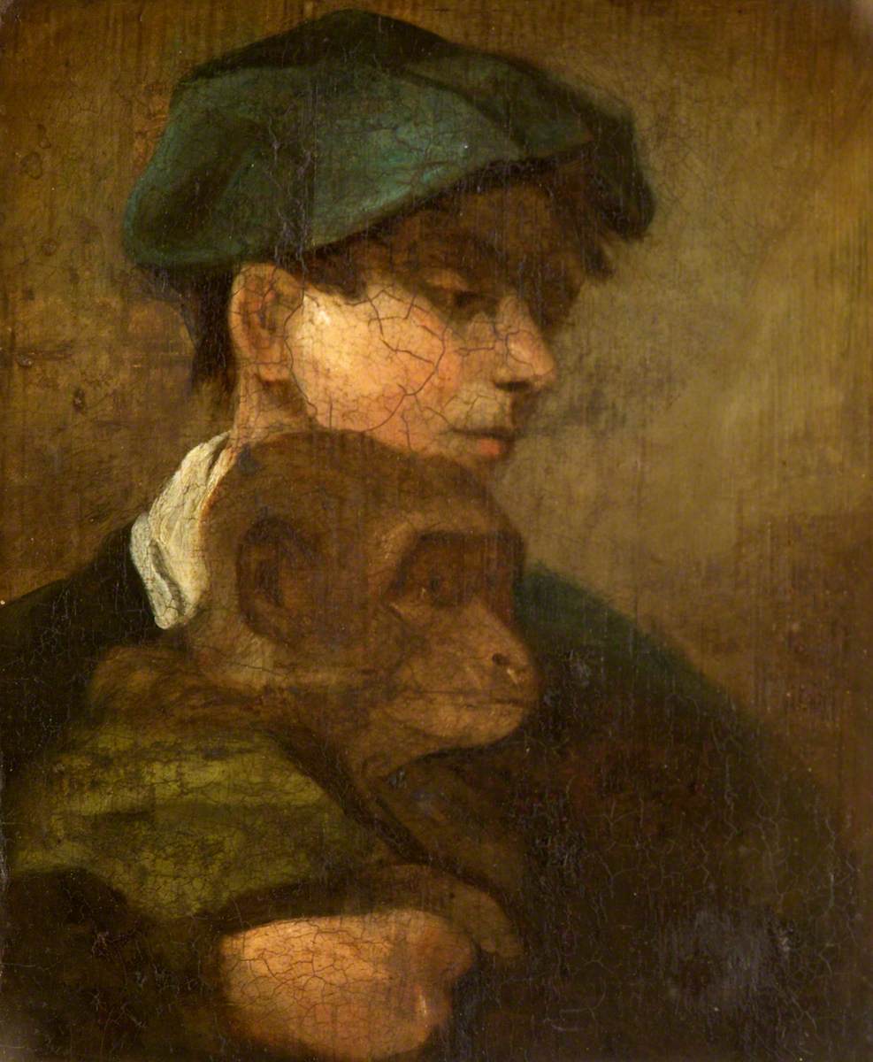 Boy in a Green Cap Holding a Monkey
