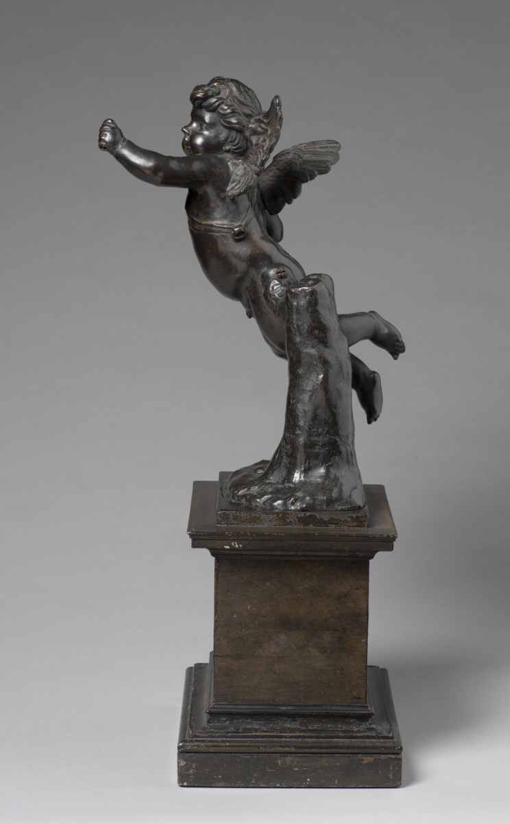 Cupid Flying by a Tree Stump