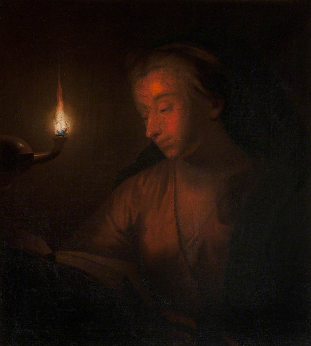 A Woman Reading by Lamplight