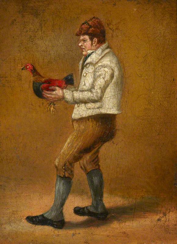 A Man Holding a Cockerel