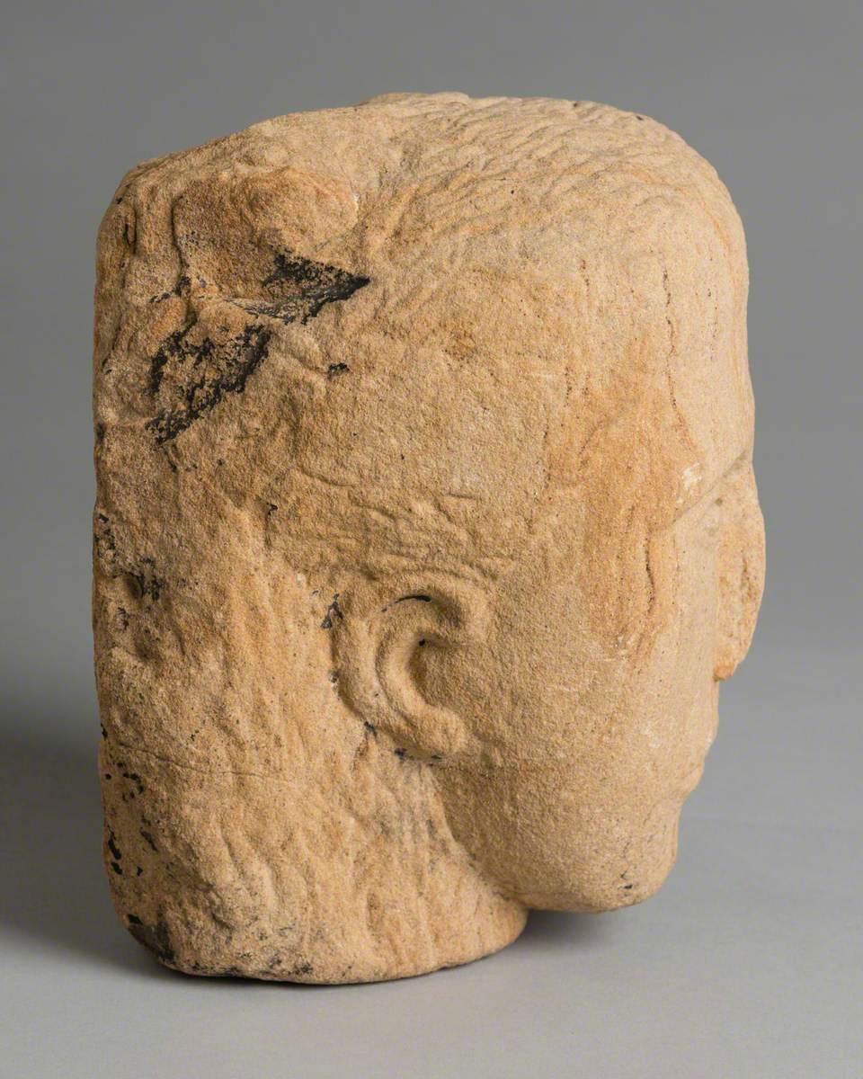 Sandstone Head with Carved Face