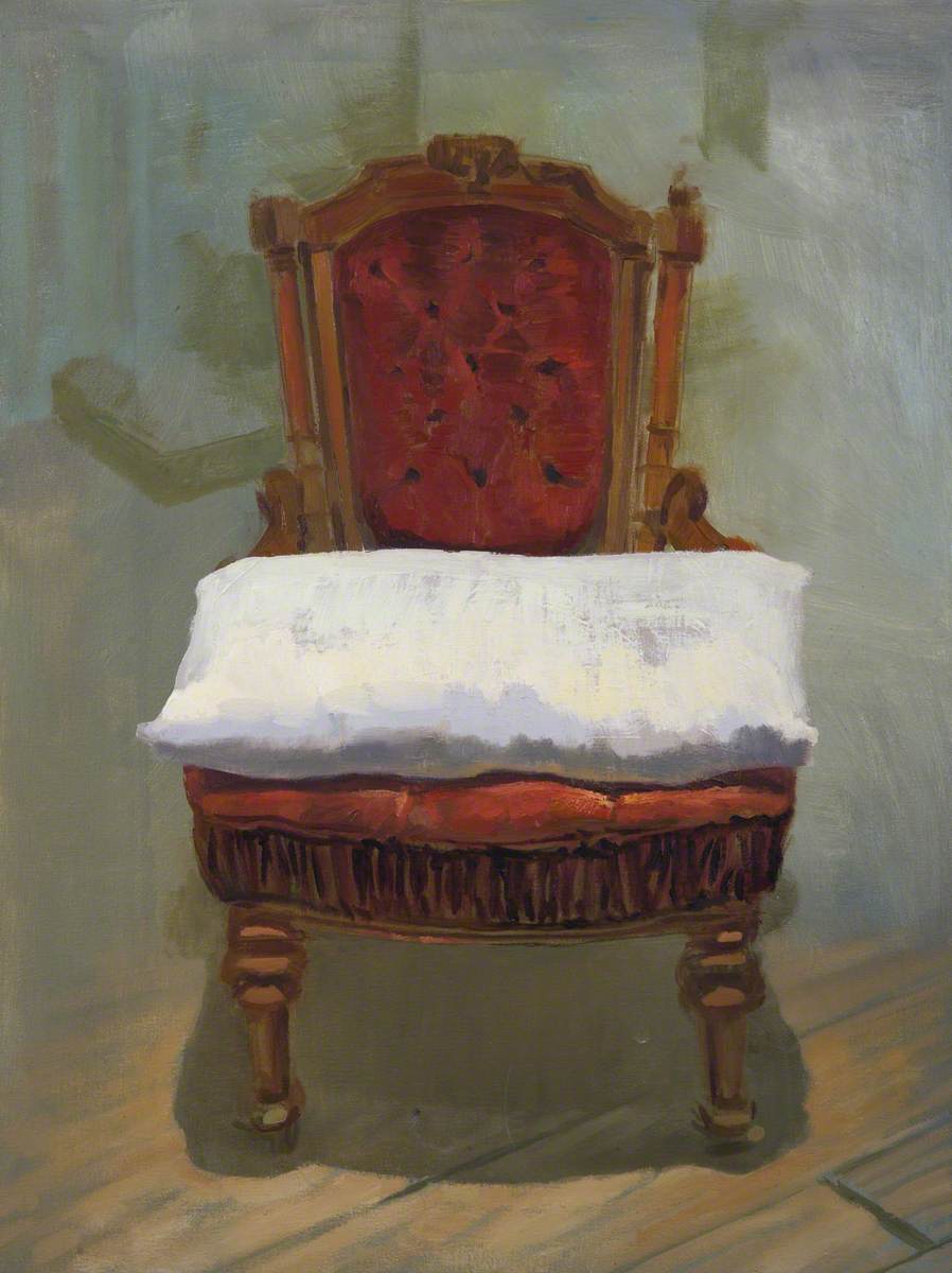 Red Chair with a Pillow