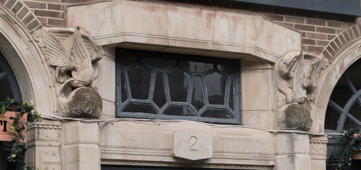 Herald Building Reliefs