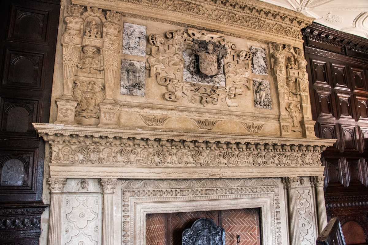 Carved Fire Surrounds and Wooden Wall Cladding