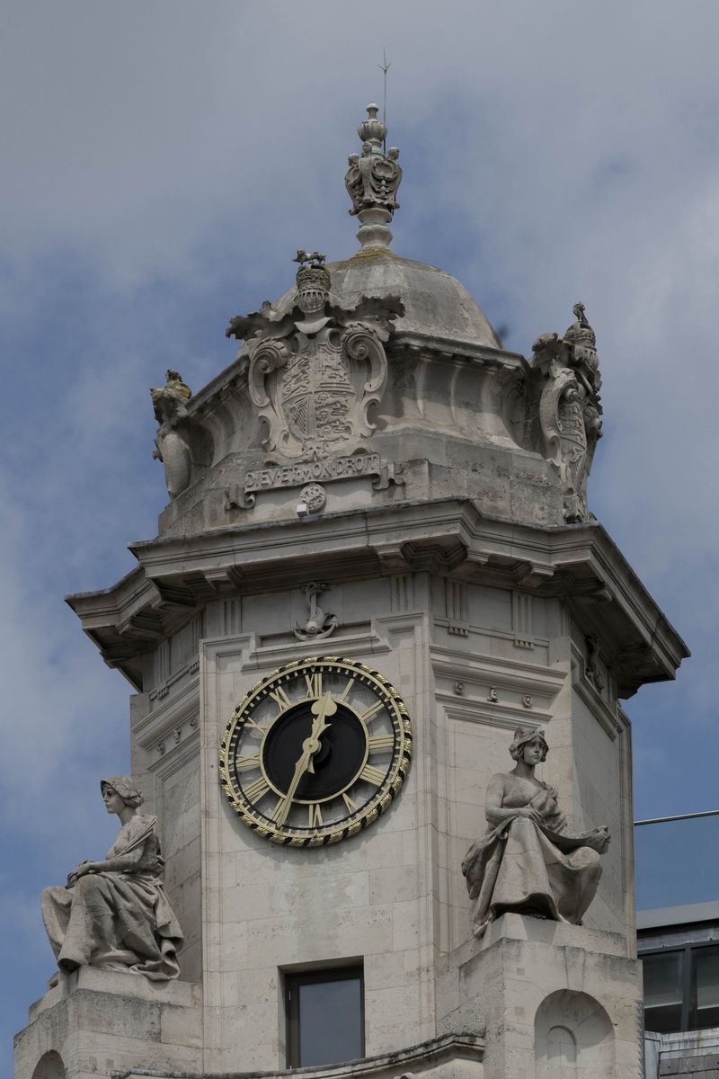 Clock Tower with Allegorical Figures and Heraldic Crest