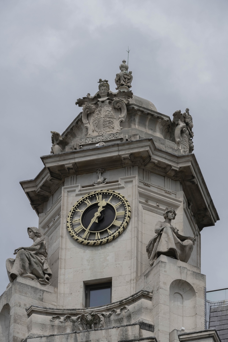 Clock Tower with Allegorical Figures and Heraldic Crest