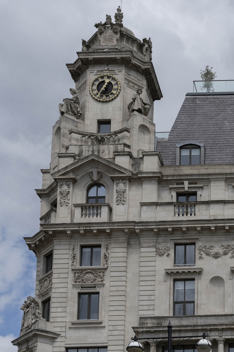 Clock Tower with Allegorical Figures and Heraldic Crest