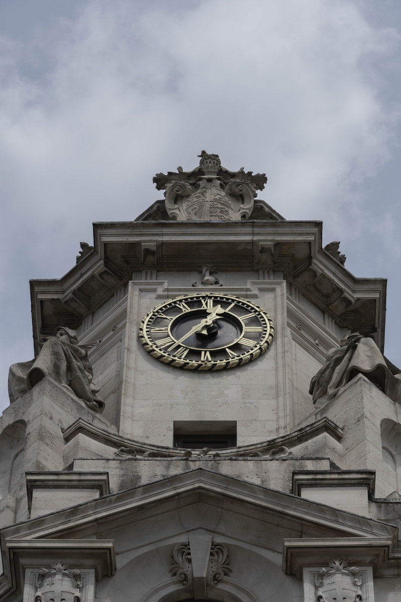 Clock Tower with Allegorical Figures and Heraldic Crest