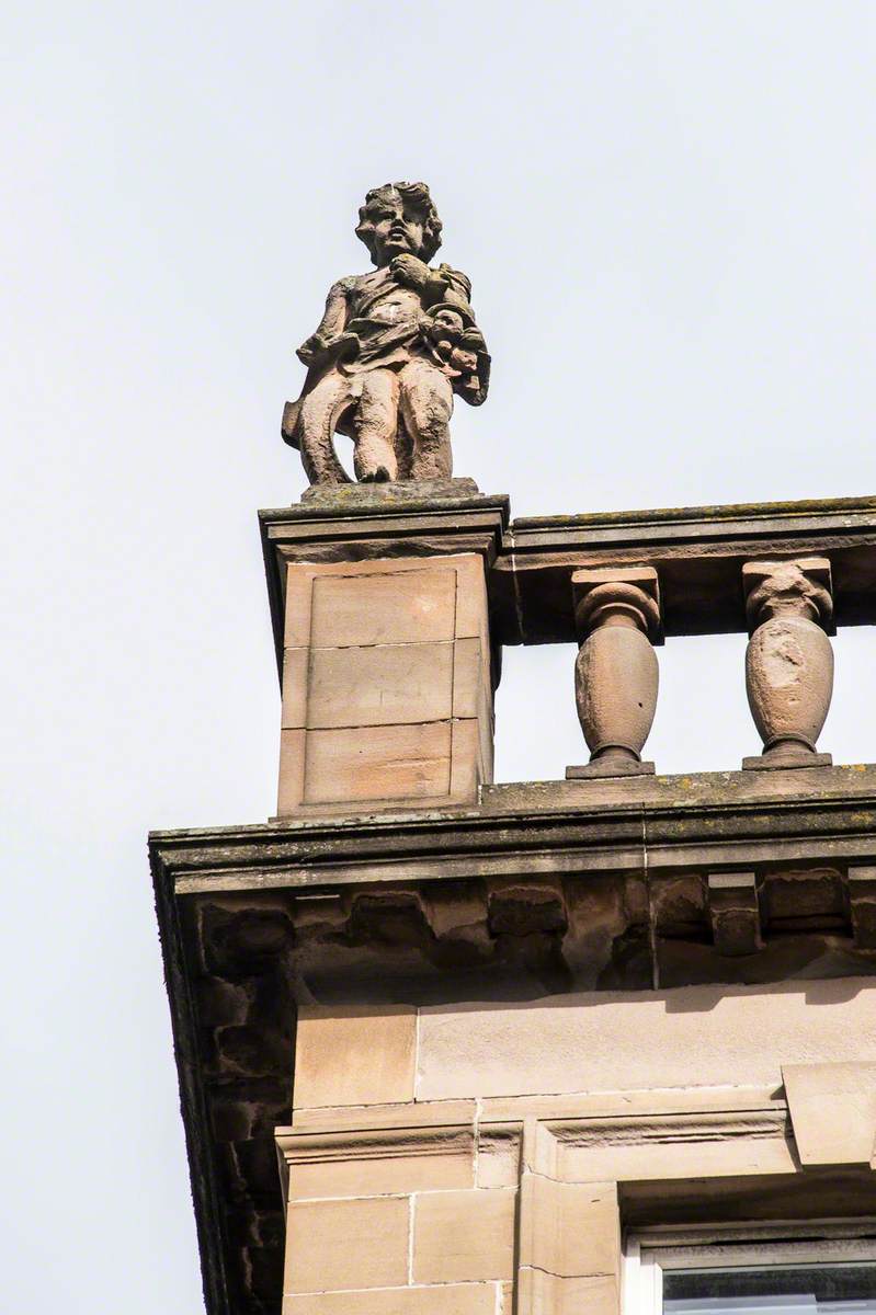 Statues of Youths and Associated Carving