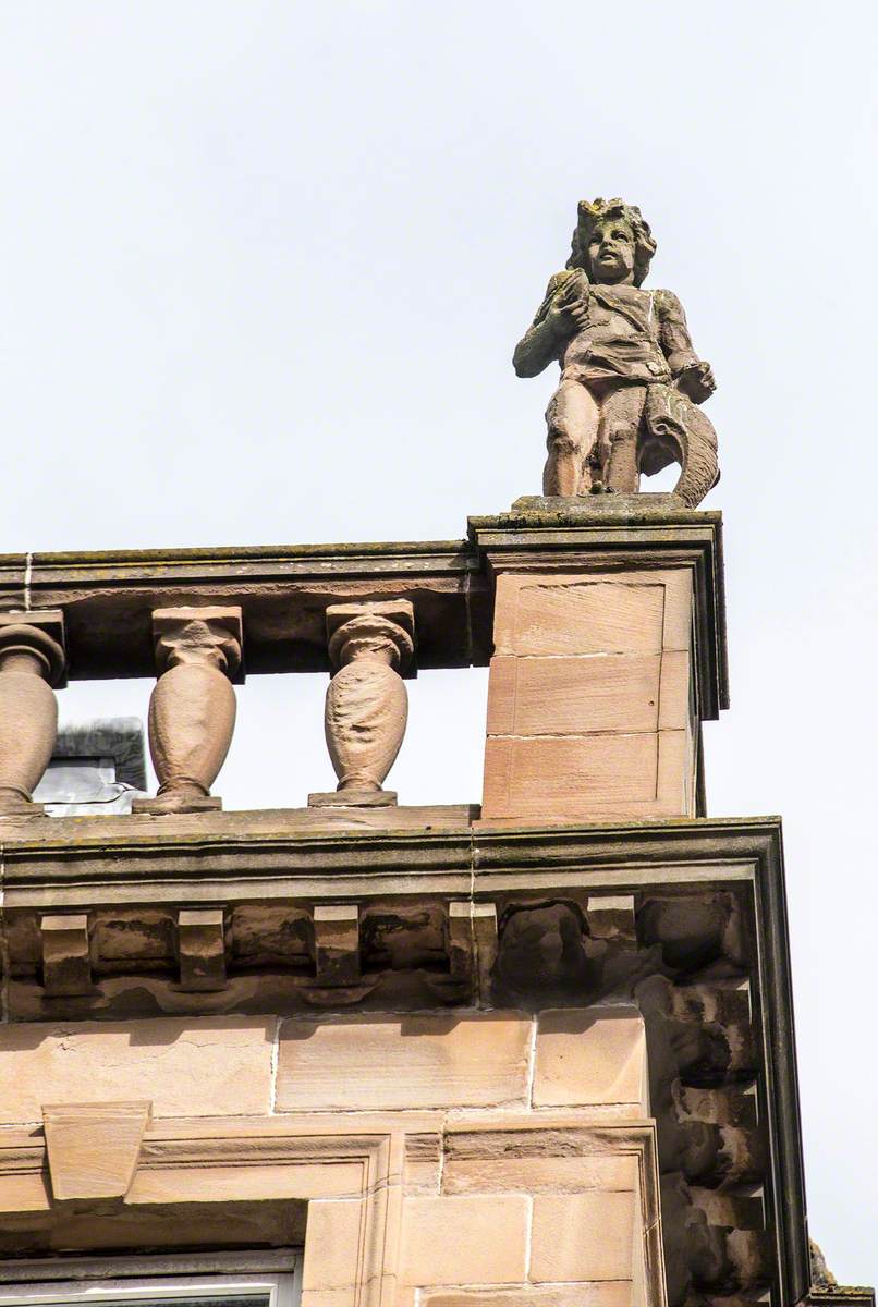 Statues of Youths and Associated Carving