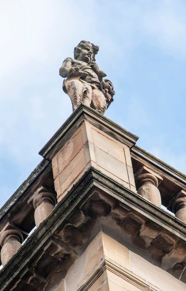 Statues of Youths and Associated Carving