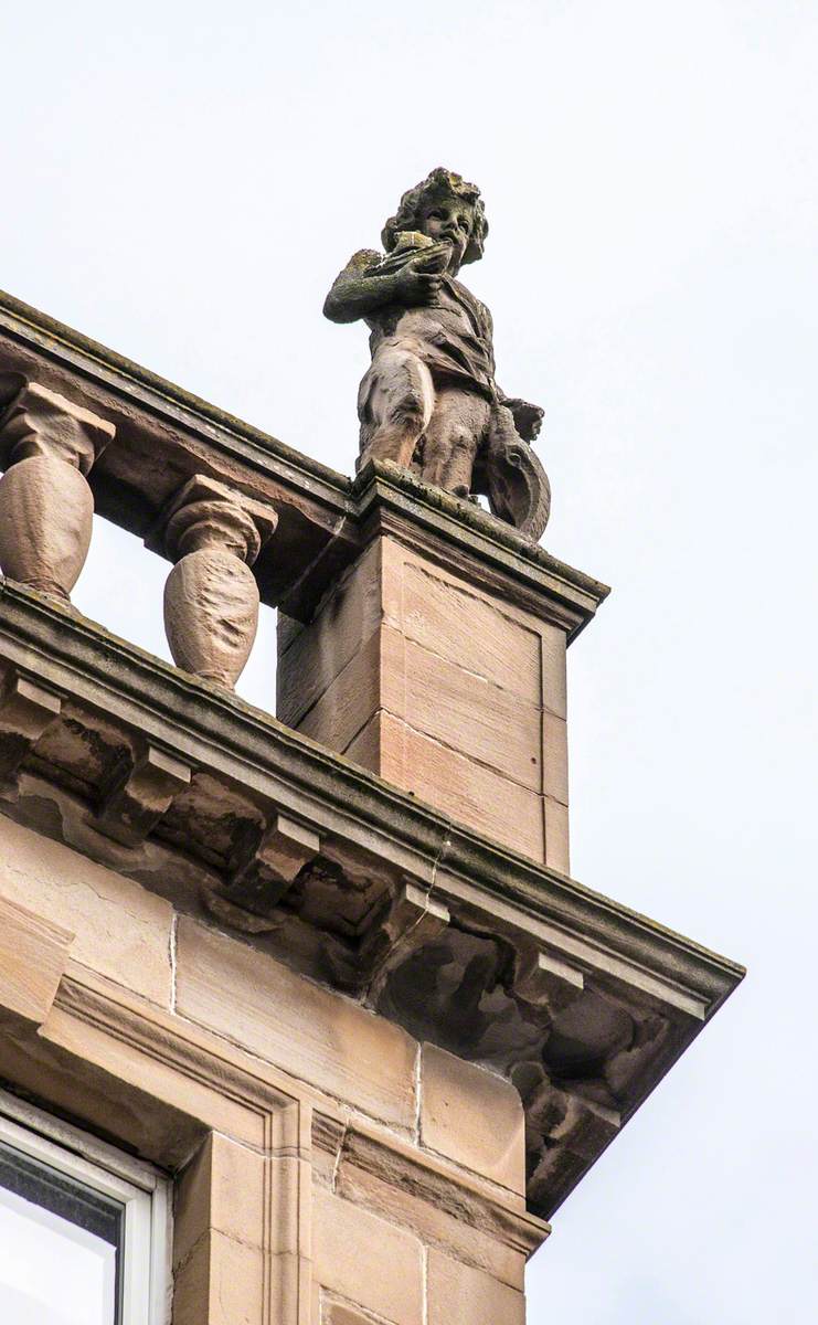 Statues of Youths and Associated Carving