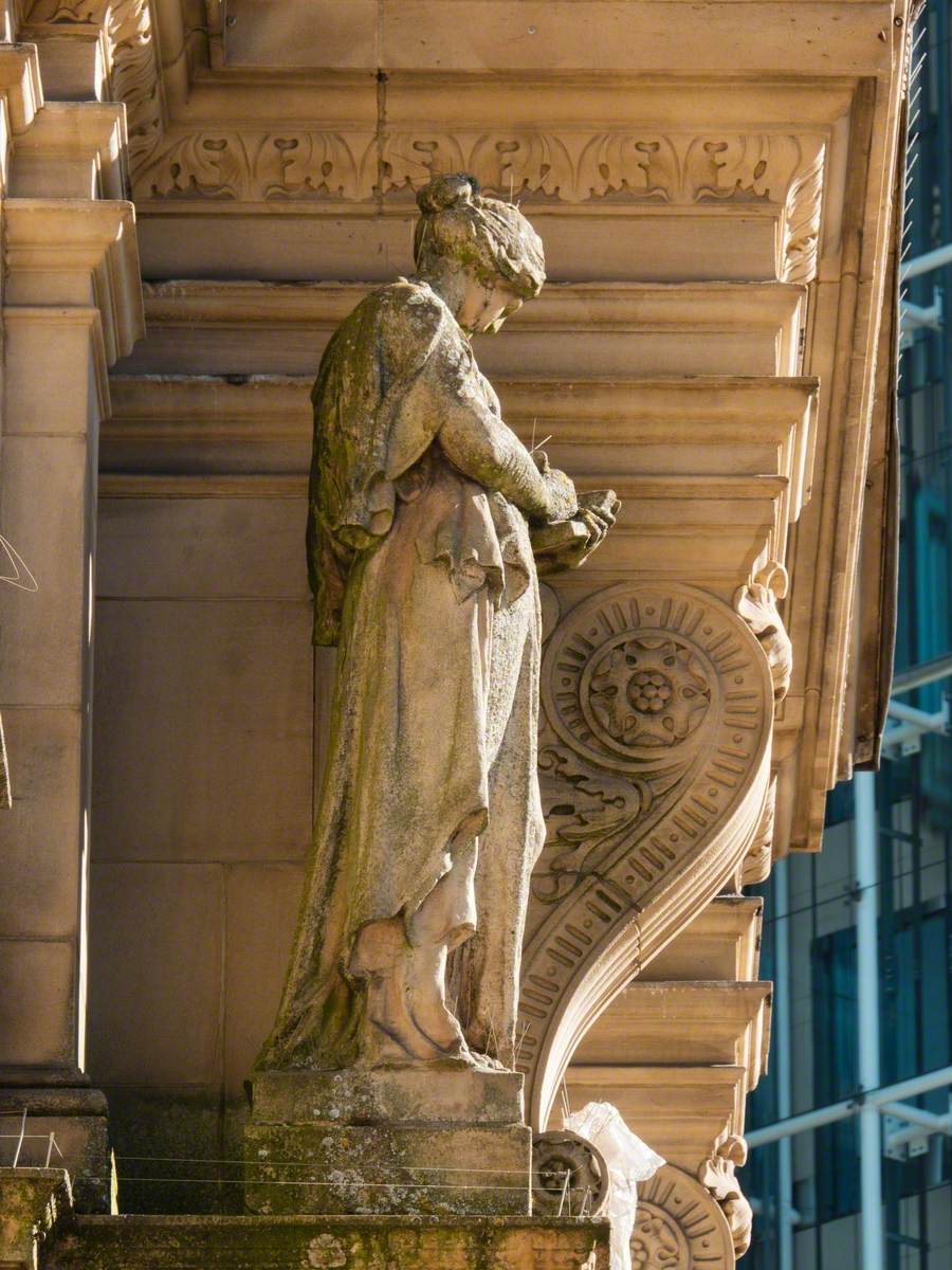 Former Post Office Façade Statues