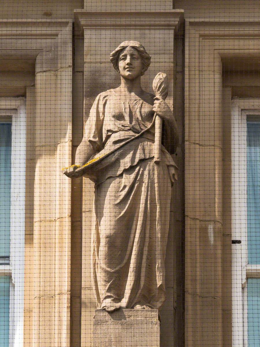 Former Post Office Façade Statues