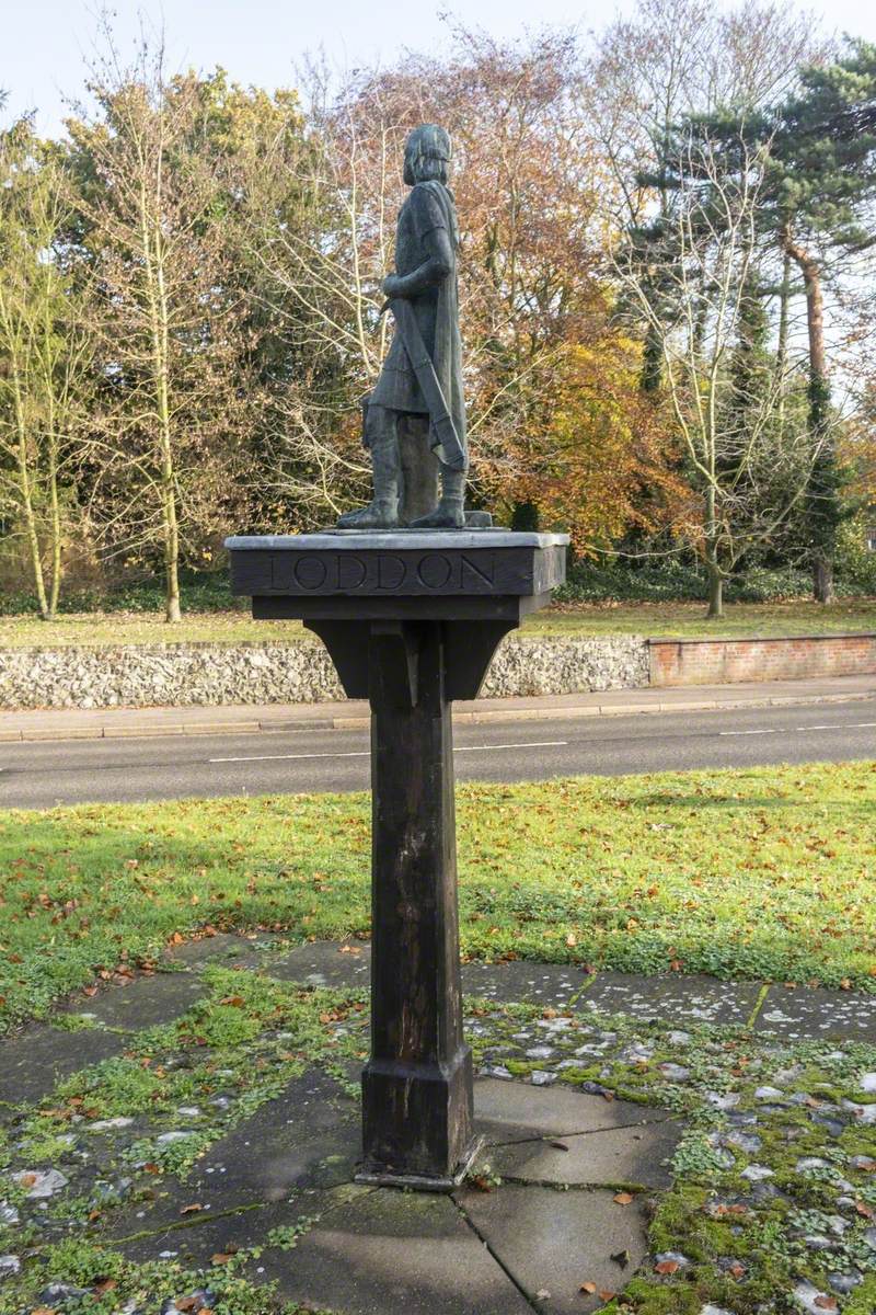 Village Sign with Statue of Aelfric Modercope