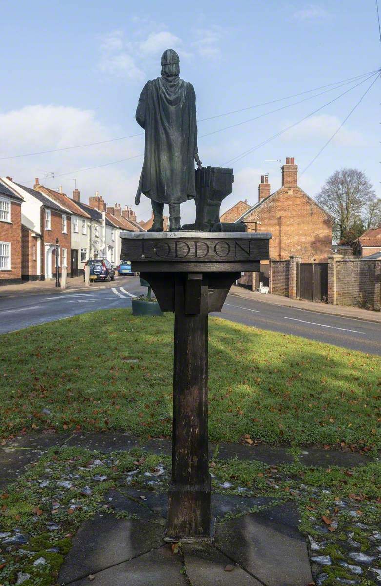 Village Sign with Statue of Aelfric Modercope