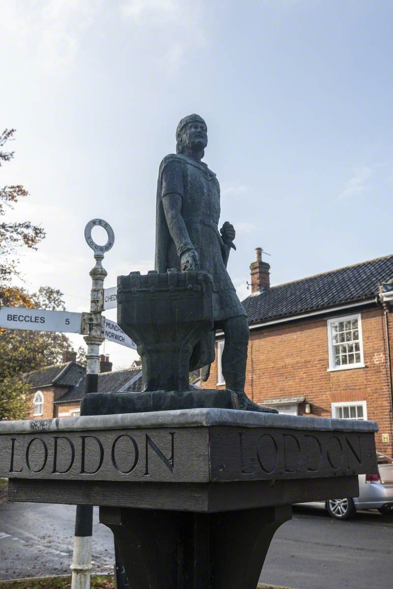 Village Sign with Statue of Aelfric Modercope