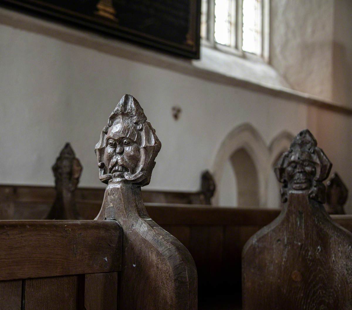 Carved Wooden Pew End Figures