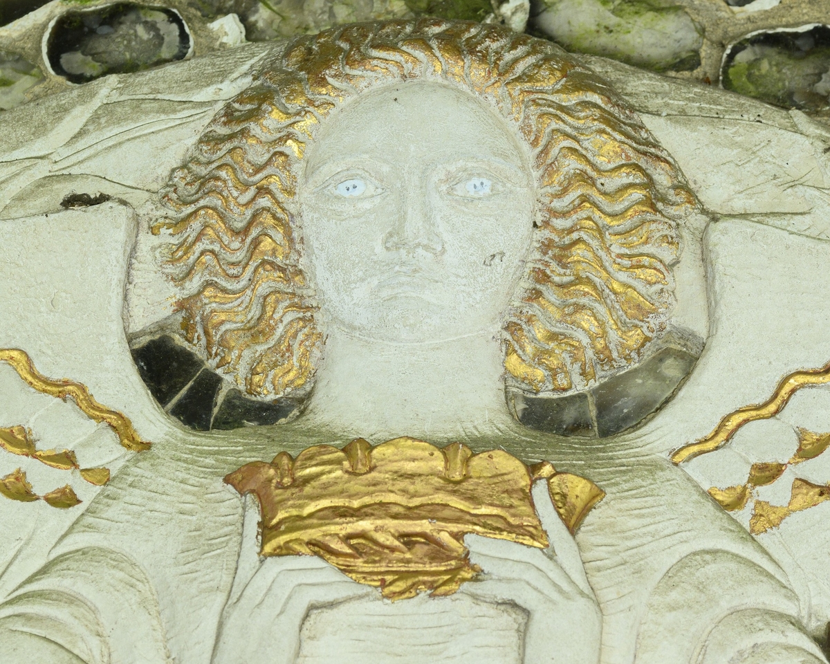 Angel of Victory within a Wreath*