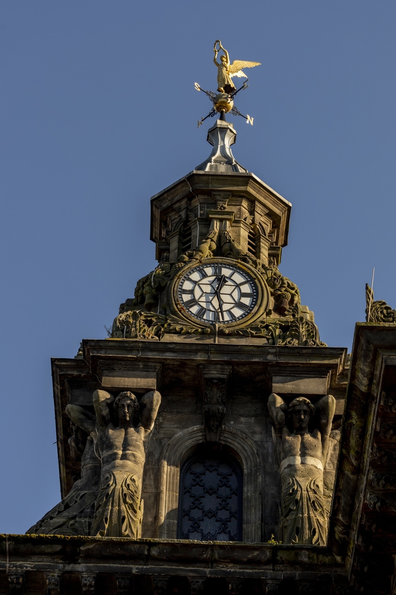 Clock Tower with Caryatids Figures