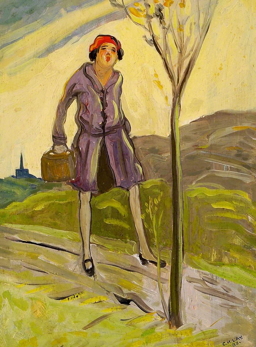 Woman in a Gray Coat with a Bag