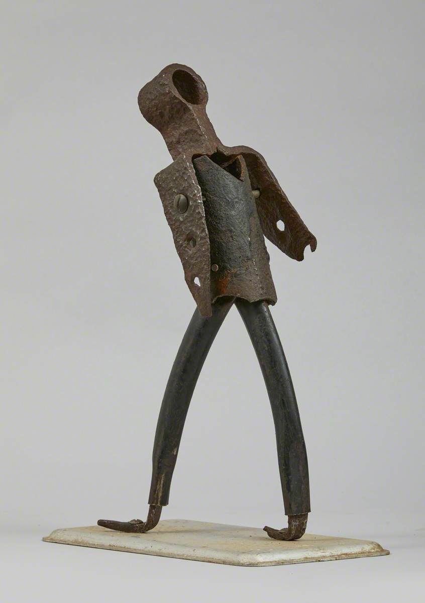 Metal Junk Sculpture: Person Walking