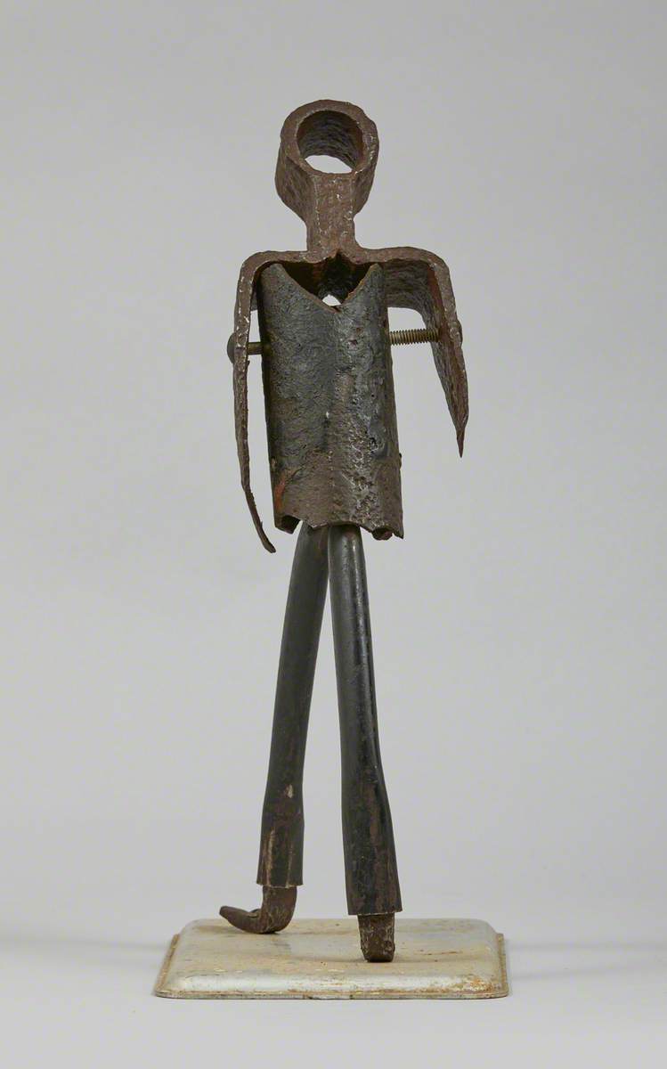 Metal Junk Sculpture: Person Walking