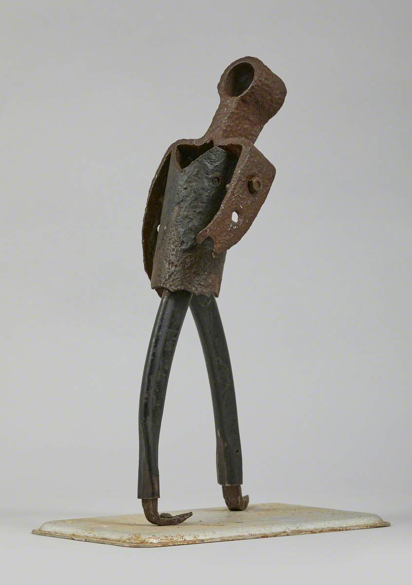 Metal Junk Sculpture: Person Walking