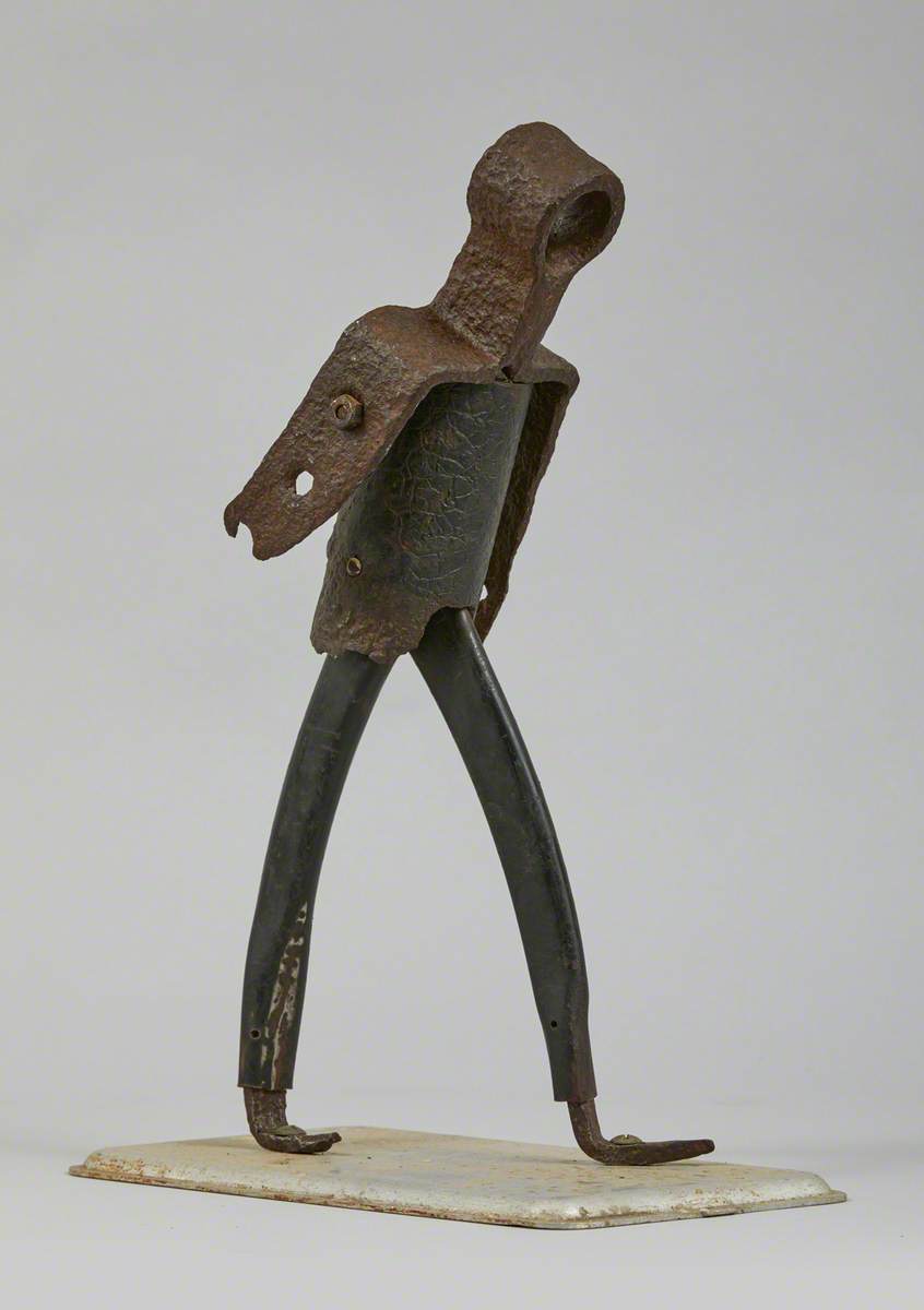 Metal Junk Sculpture: Person Walking