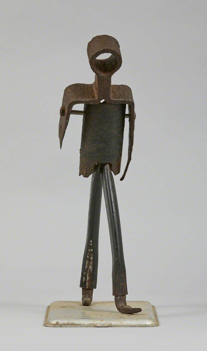 Metal Junk Sculpture: Person Walking