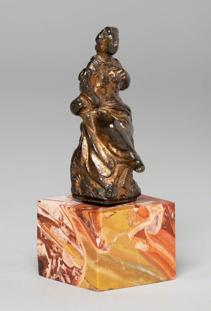 Seated Female Figure Holding an Orb and a Bird