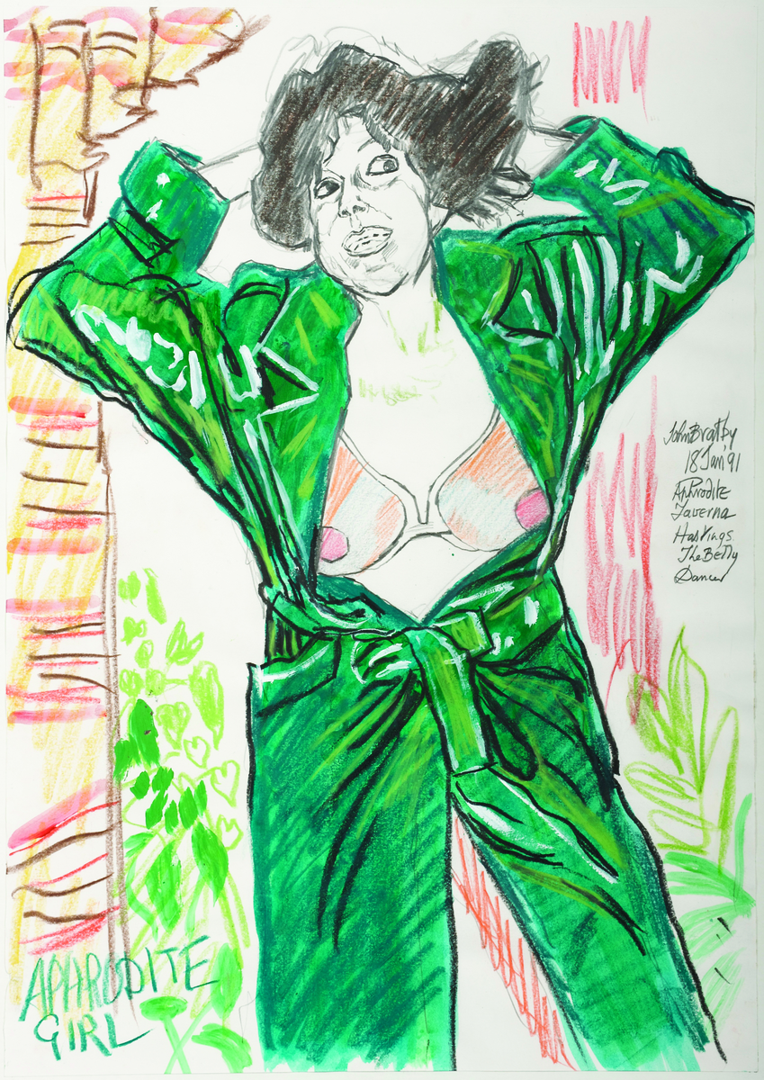 Aphrodite Girl in Green Mac with Hands Fluffing Up Hair