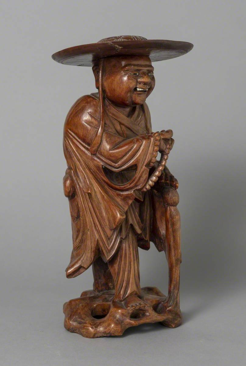 Okimono of Travelling Buddhist Priest with Prayer Beads