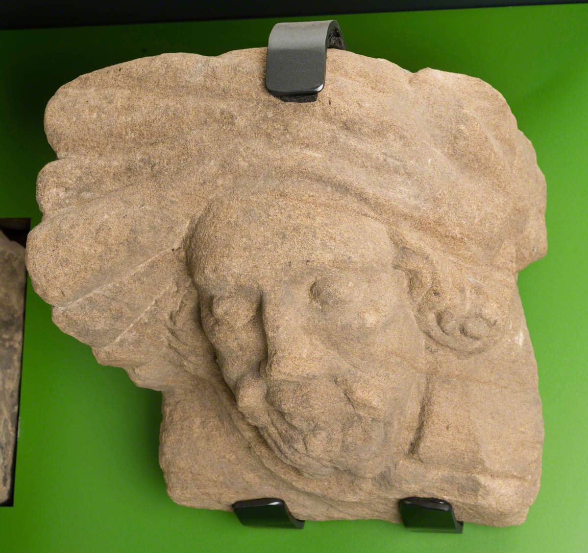Sandstone Corbel with Realistic Male Human Head Wearing Hat or Turban: Monk Bretton Priory