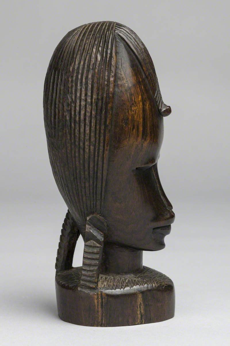 Female Head with High Ribbed Hairstyle