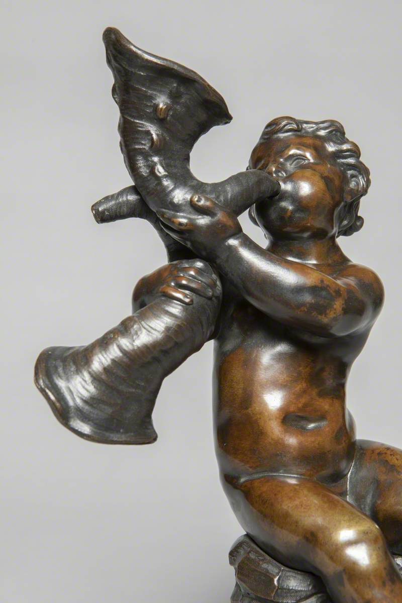 Boy Blowing Double Conch Shell