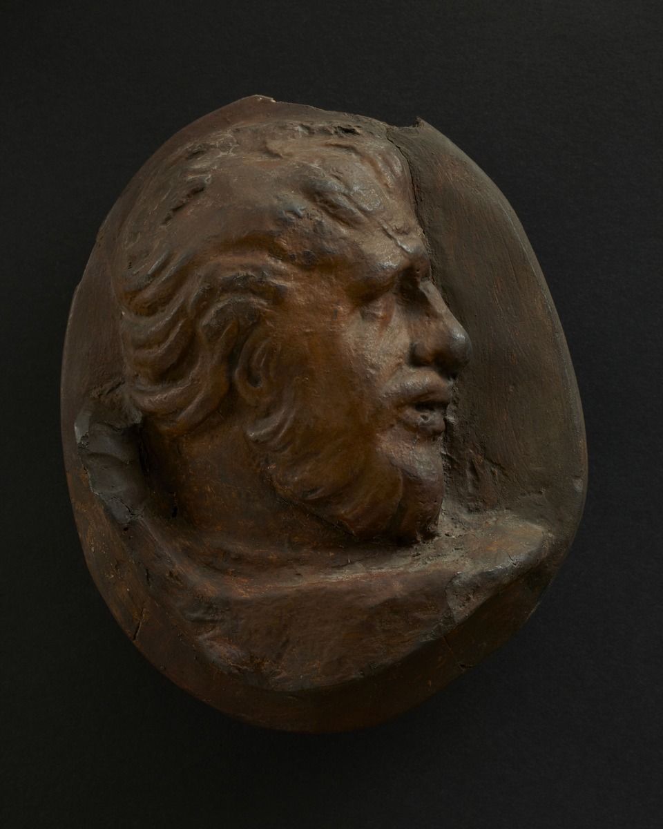 Head of Dacian Man with Swept Back Hair