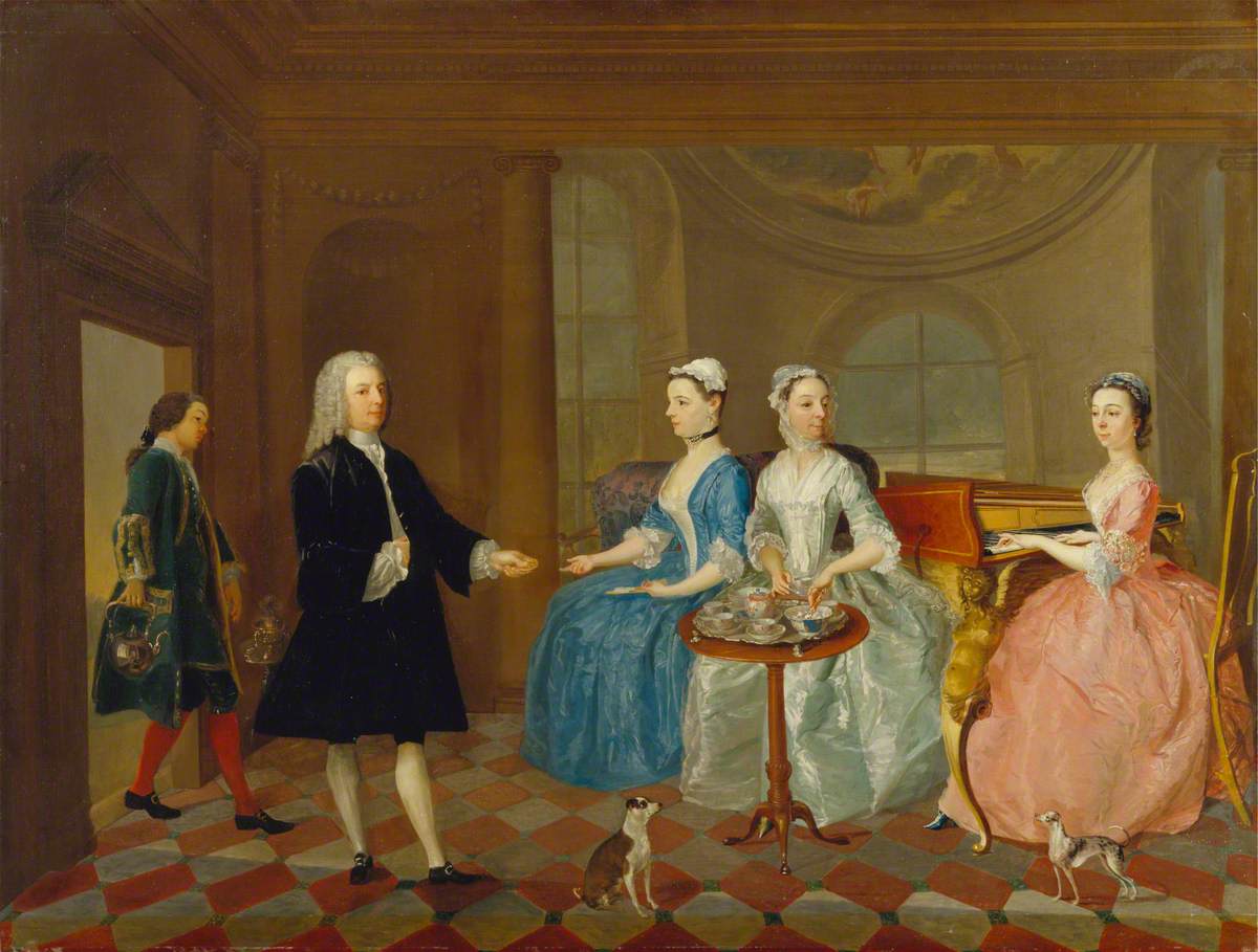 A Family Being Served with Tea