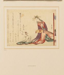 Woman with a koto on her lap, looking at her dog