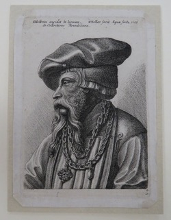 Bearded man with chain necklace